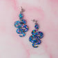Mystical moon snakes - purple, blue & gold Resin Earrings