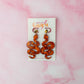 Bonfire snakes - burnt orange Resin Earrings